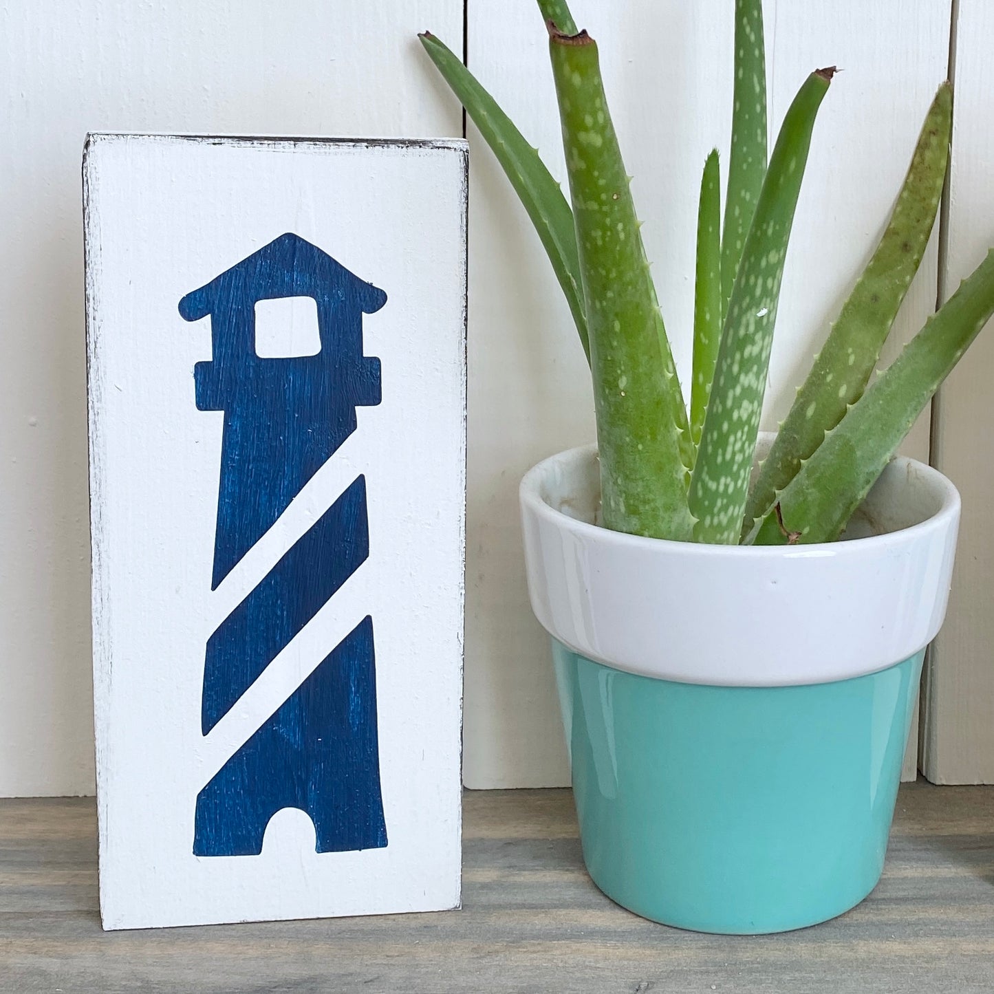 Lighthouse Sign Coastal home decor and inspiration for the beach lover, gifts from Anchoredsouldesigns