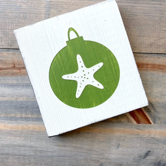 Coastal Christmas Decor, Anchored Soul Designs Starfish Ornament wood sign white background with green design, beach house holiday decor coastal design