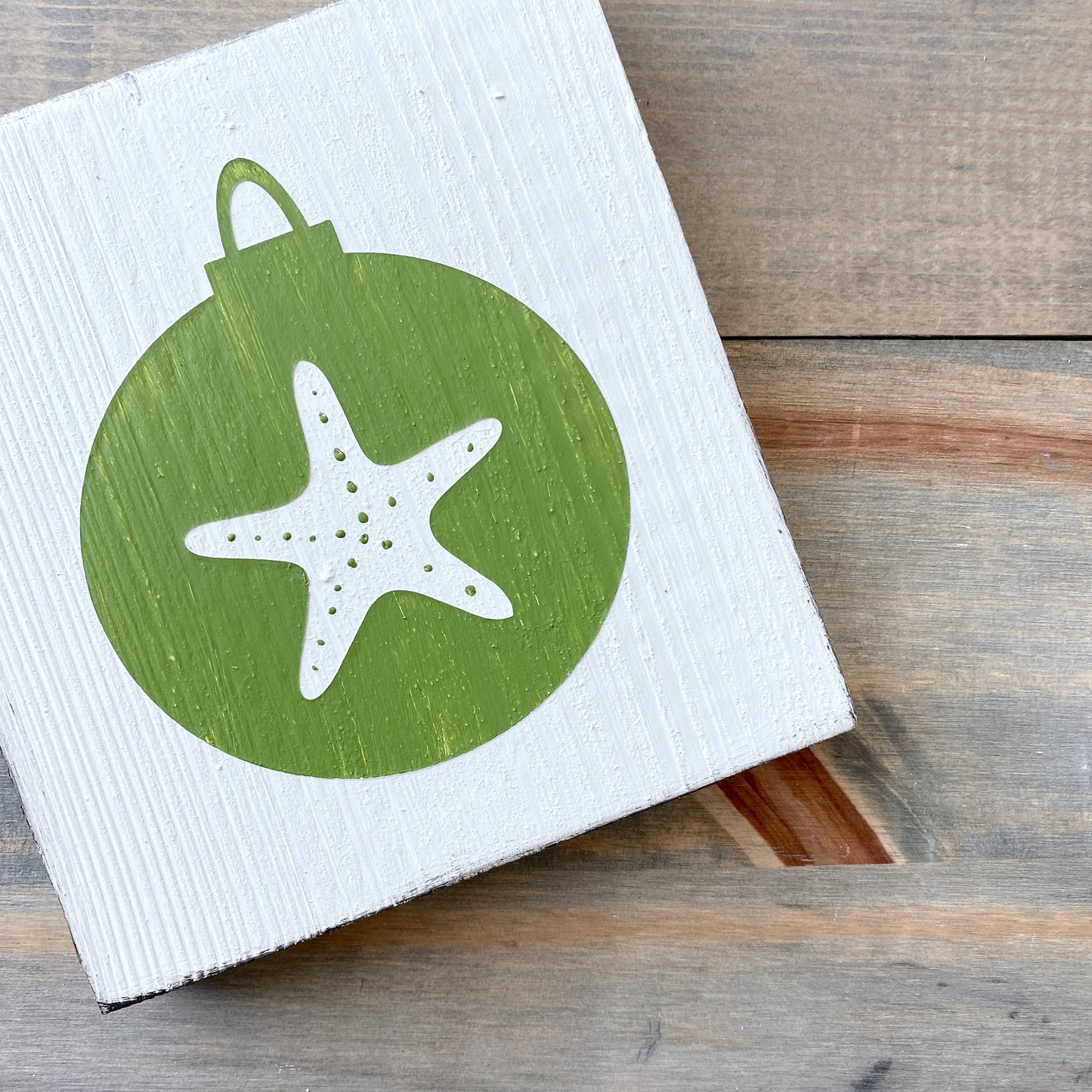 Coastal Christmas Decor, Anchored Soul Designs Starfish Ornament wood sign white background with green design, beach house holiday decor coastal design