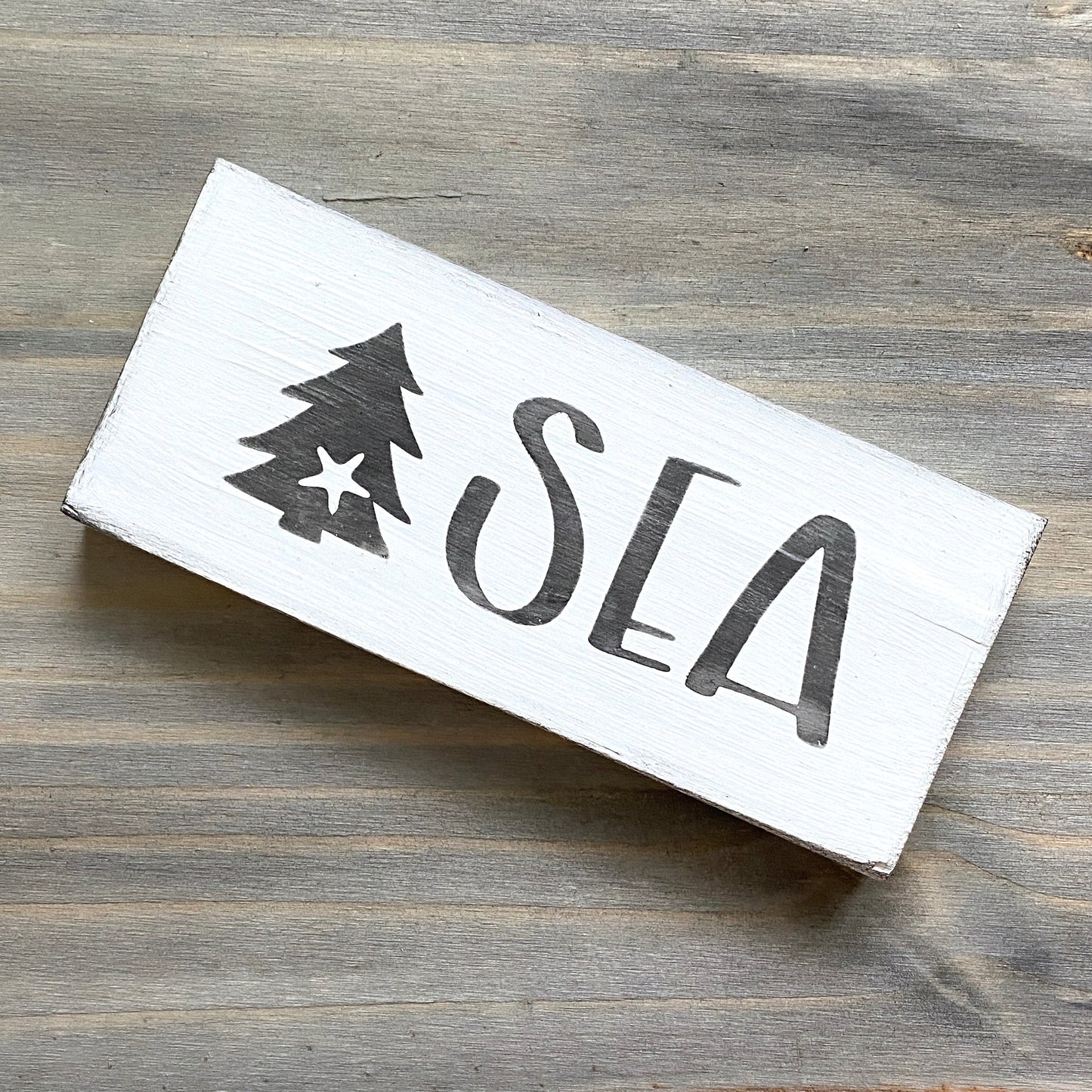 Coastal Christmas Decor, Anchored Soul Designs Sea Christmas wood sign with small tree and starfish white background with black design, beach house holiday decor coastal design