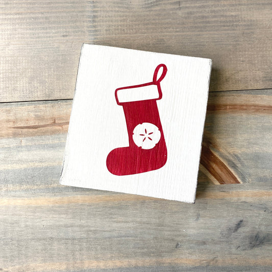 Coastal Christmas Decor, Anchored Soul Designs Sand Dollar stocking wood sign white background with red design, beach house holiday decor coastal design