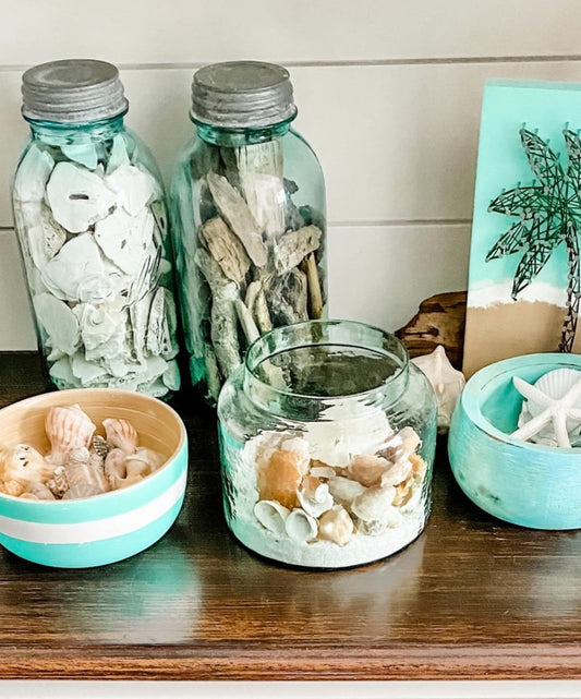 jars and bowls filled with sea treasures, tips for decorating coastal style with jars