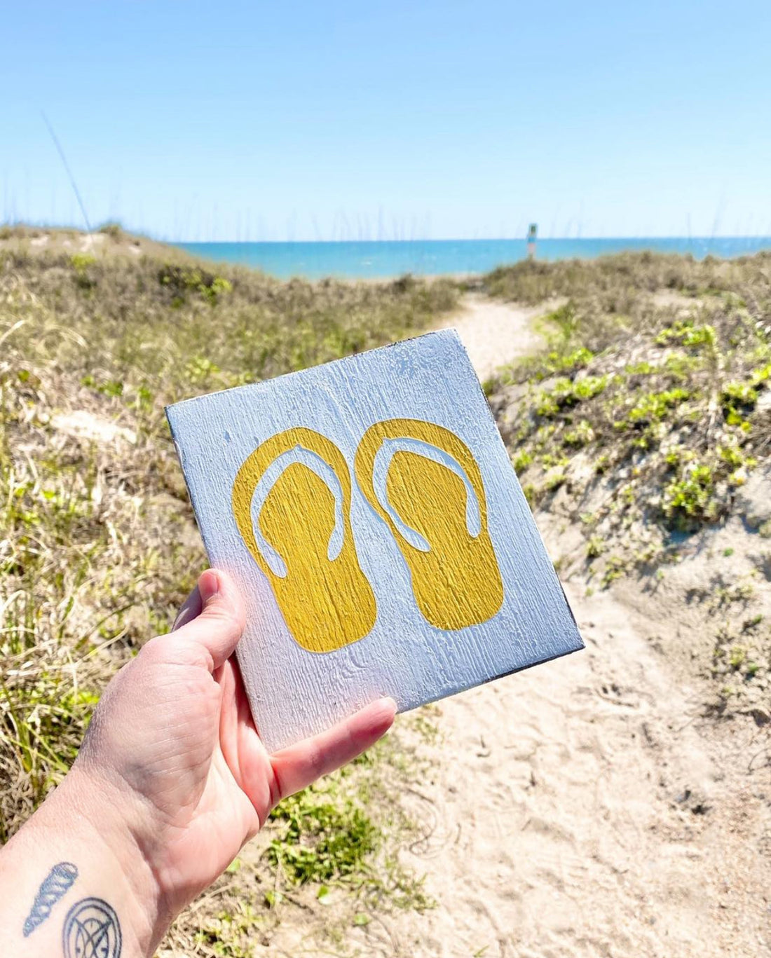 Handmade beach signs for year-round coastal home decor including sunshine, summer, and anchor signs