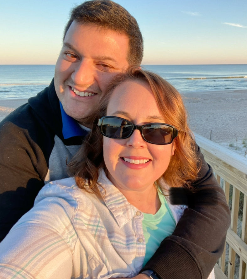 Stacey Haynes, artist and founder of Anchored Soul Designs, handmade coastal signs on Amelia Island Florida