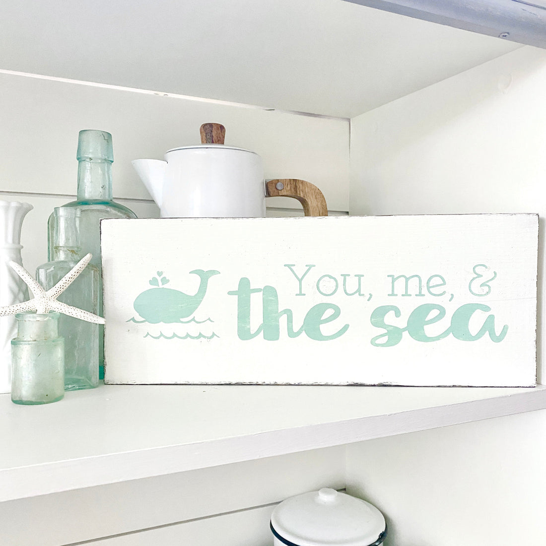 Mint coastal decor ideas for a soft, airy beach home. Discover handmade coastal signs and beach house decor in fresh, calming mint tones. you me and the sea sign in mint
