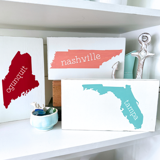 Custom gifts for teachers and students, hand painted custom state signs sitting on a shelf with coastal decor
