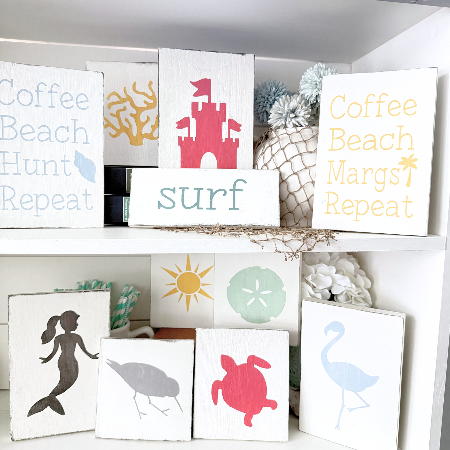 Tropical Decor from Anchored soul Designs. Handmade tropical signs displayed on a shelf