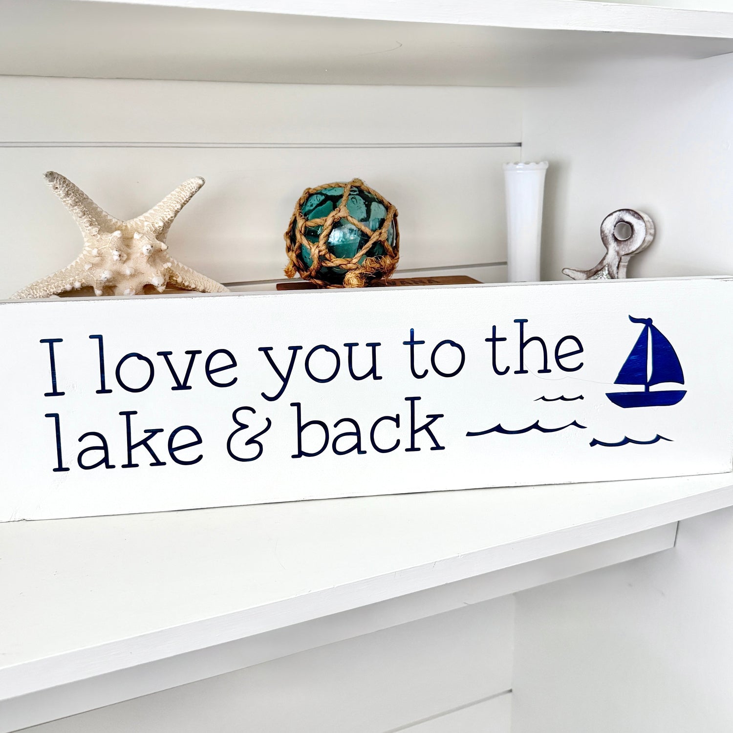 Lake and nautical love signs featuring romantic quotes and hearts with waterfront themes for lakehouse and coastal decor