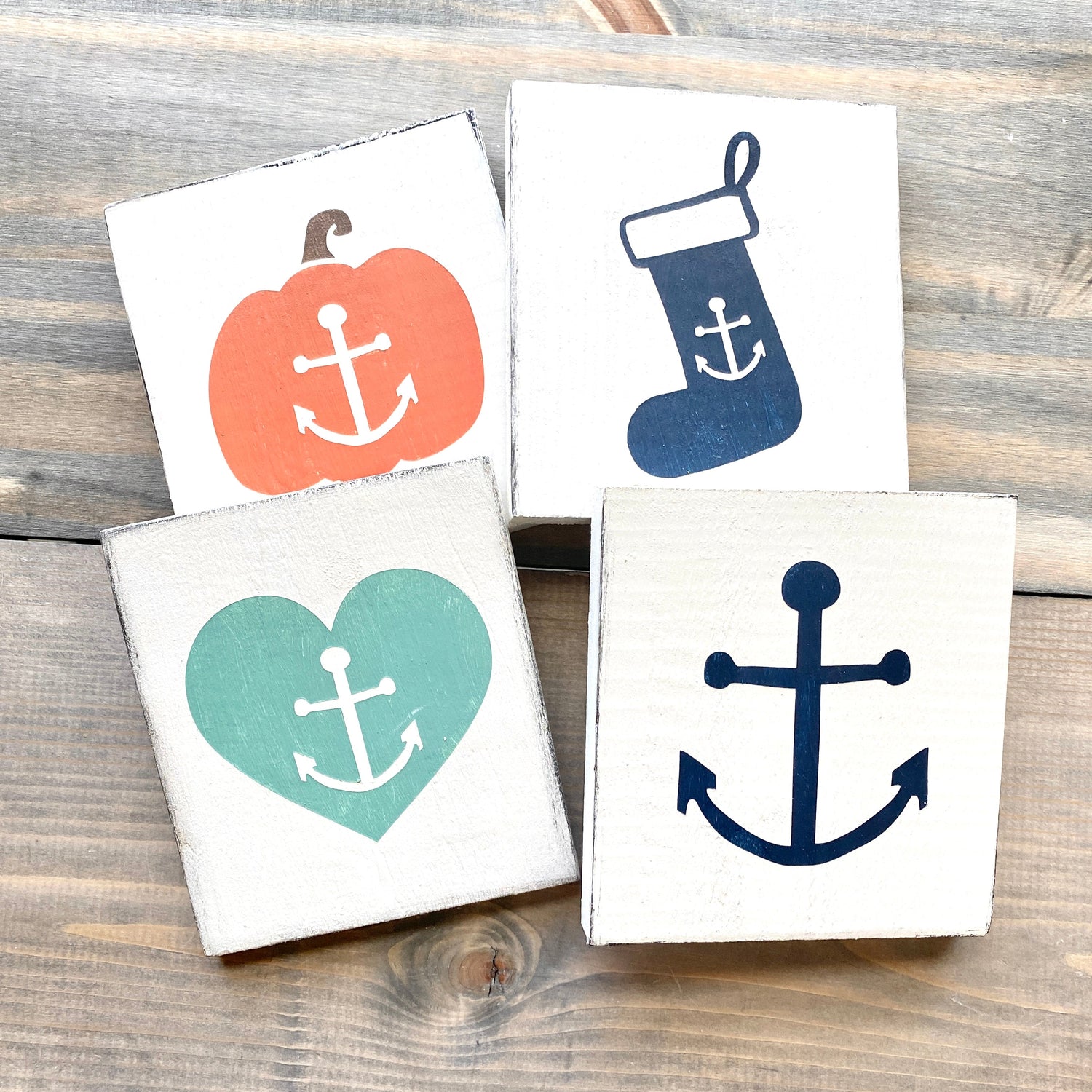 All seasonal signs collection featuring coastal fall, beach Christmas, lake Christmas, and Valentine's decor for year-round holiday decorating