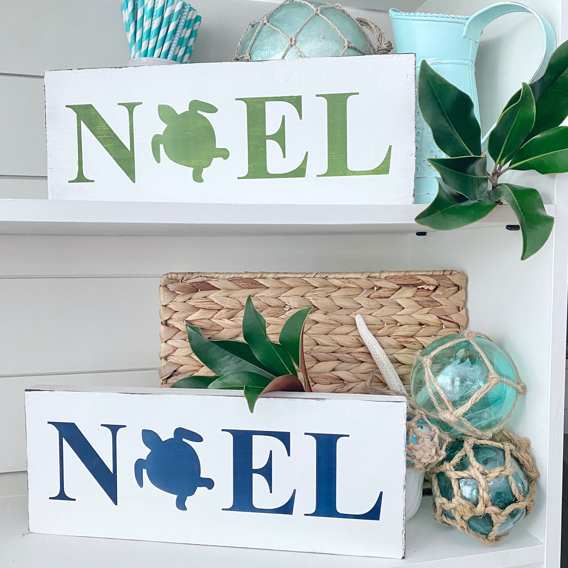 Coastal Christmas Decor, Anchored Soul Designs Noel Sea Turtlee Christmas wood sign white background with green and navy design, beach house holiday decor coastal design