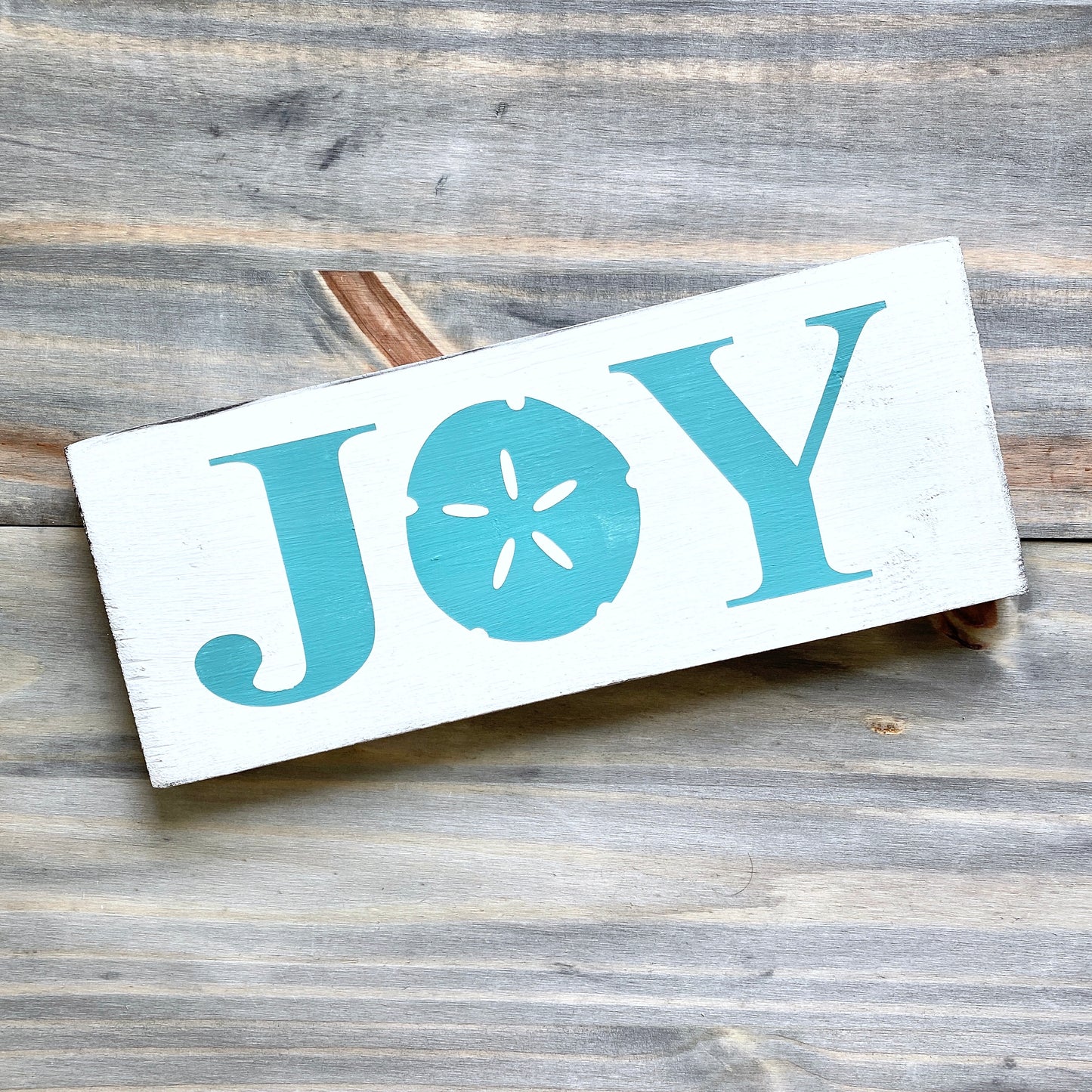 Coastal Christmas Decor, Anchored Soul Designs Joy Sand Dollar Christmas wood sign white background with aqua design, beach house holiday decor coastal design