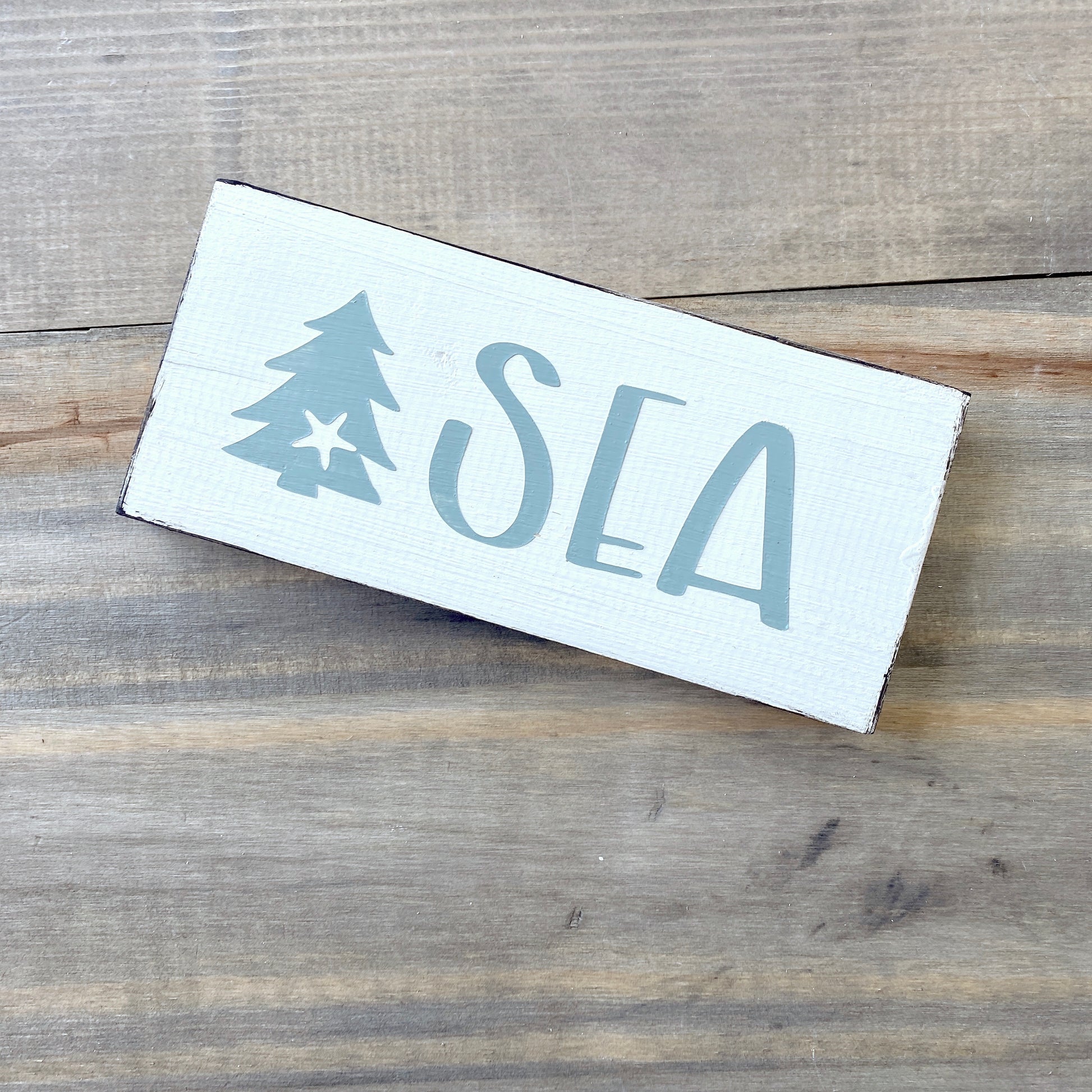Coastal Christmas Decor, Anchored Soul Designs Sea Christmas wood sign with small tree and starfish white background with sage green design, beach house holiday decor coastal design