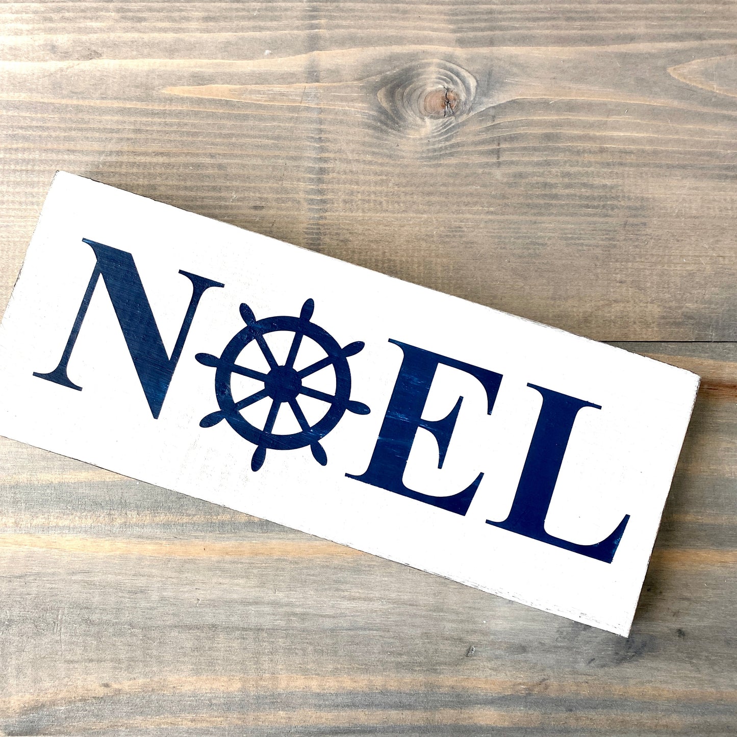 Coastal Christmas Decor, Anchored Soul Designs Noel Ship Wheel Christmas wood sign white background with Navy design, beach house holiday decor coastal design