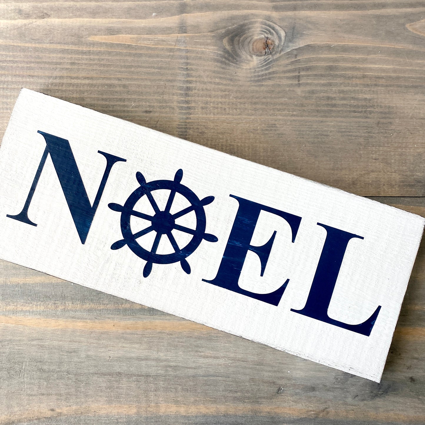 Coastal Christmas Decor, Anchored Soul Designs Noel Ship Wheel Christmas wood sign white background with Navy design, beach house holiday decor coastal design