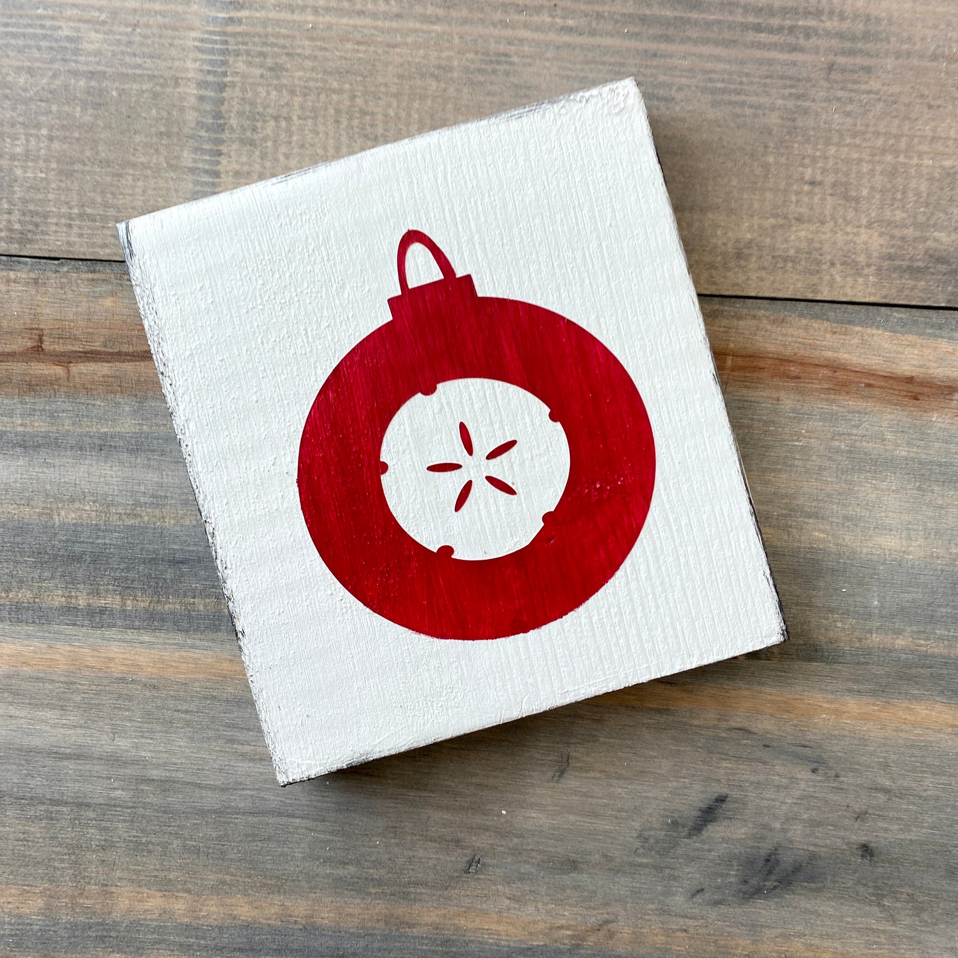 Coastal Christmas Decor, Anchored Soul Designs Sand Dollar Ornament wood sign white background with red design, beach house holiday decor coastal design