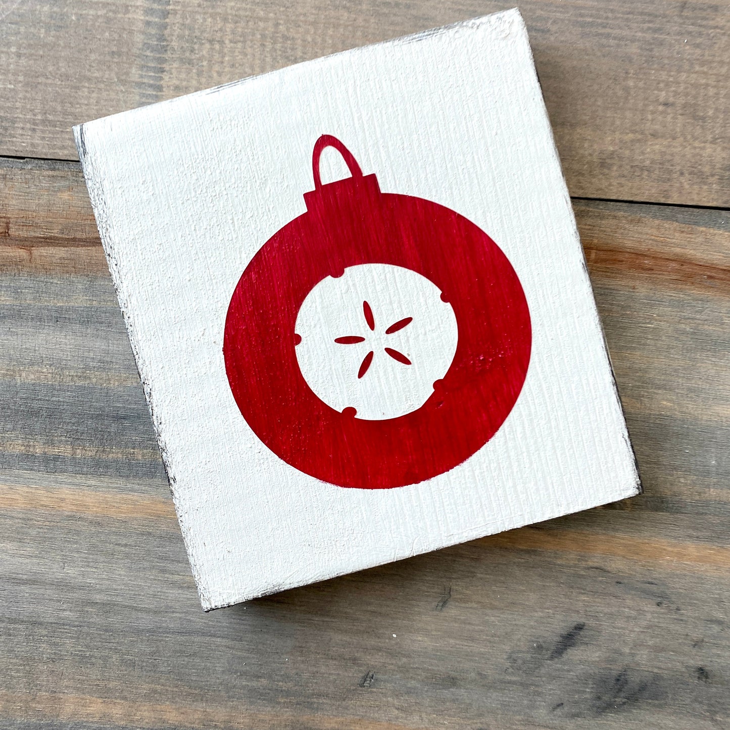 Coastal Christmas Decor, Anchored Soul Designs Sand Dollar Ornament wood sign white background with red design, beach house holiday decor coastal design